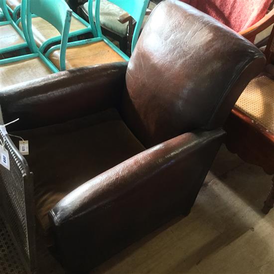 1930s brown leather upholstered armchair,(-)